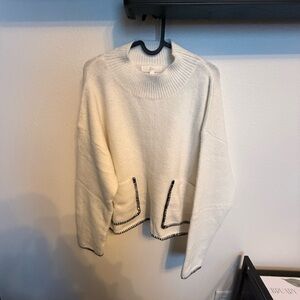Cozy White Sweater with Black Trim